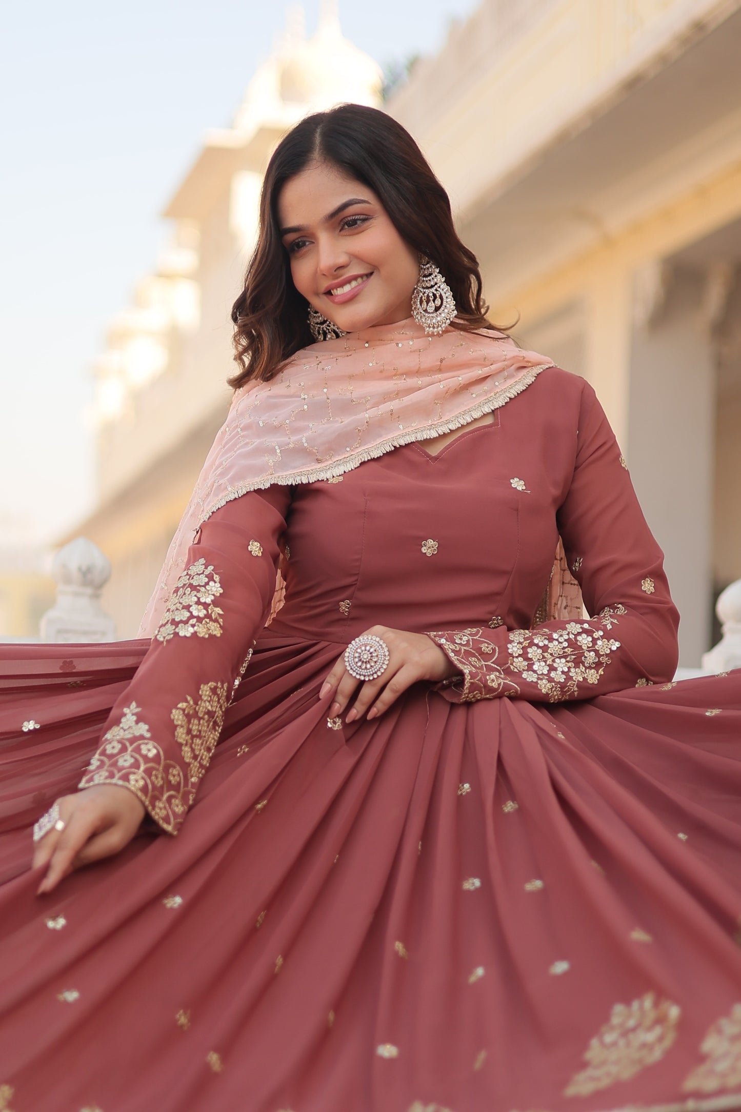 Brown faux georgette designer gown with embroidered sequins - Yashodhara Lifestyle