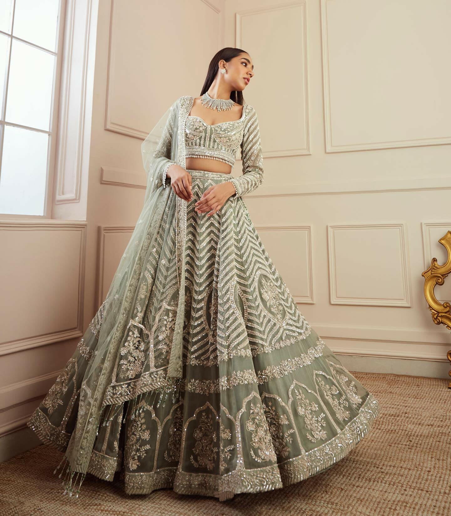 Saga Green designer lehenga - Yashodhara Lifestyle