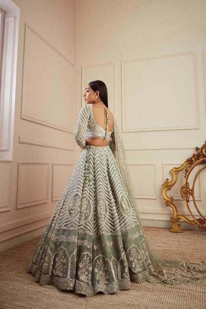 Saga Green designer lehenga - Yashodhara Lifestyle